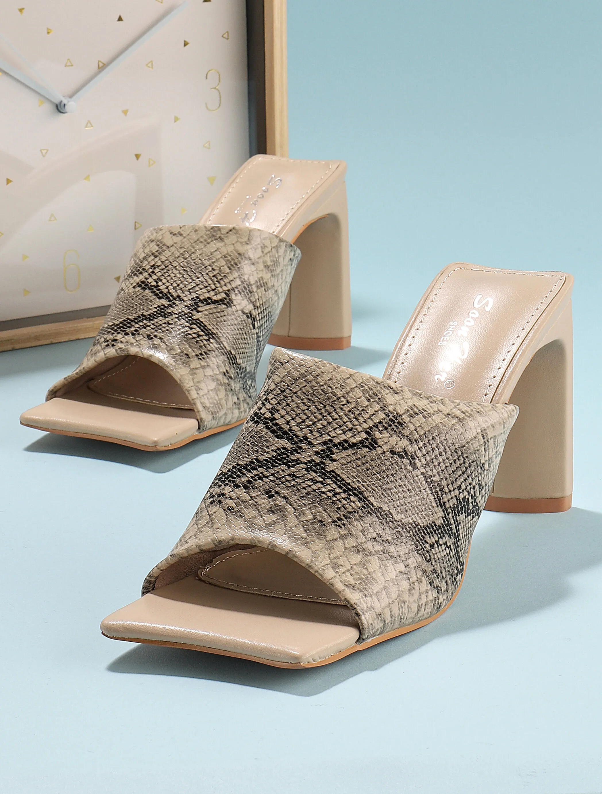 Mules à talon Français stylisé - python